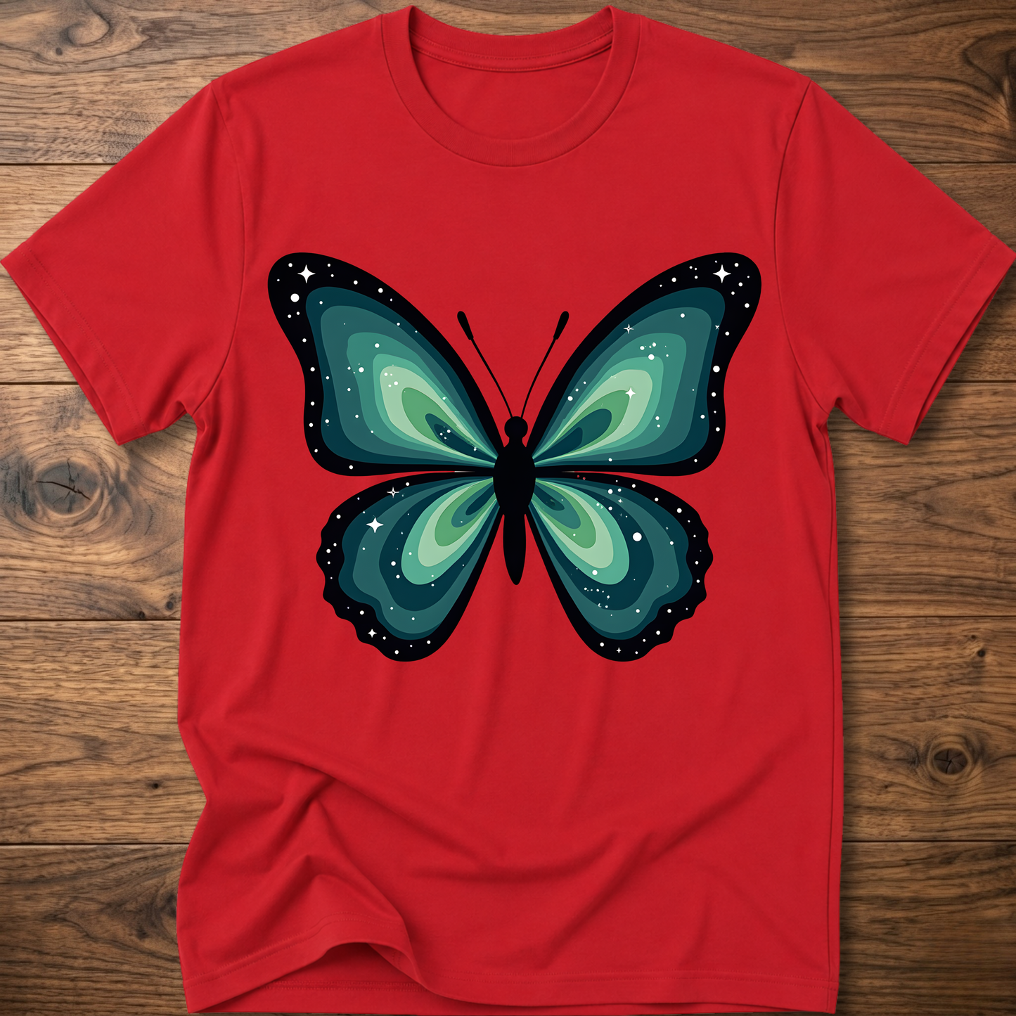 Red t-shirt with teal butterfly graphic in navy outline, crew neck.