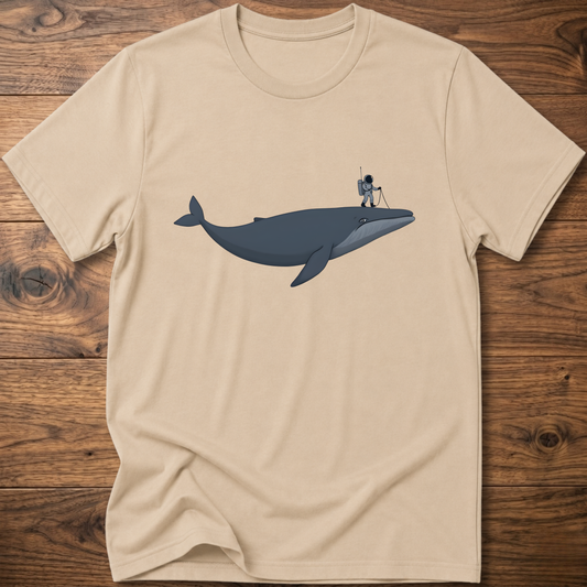 Beige astronaut whale T-shirt with graphic whale and astronaut standing on back fin