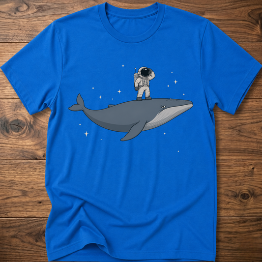 Royal blue short-sleeve t-shirt with astronaut riding a whale graphic and star accents