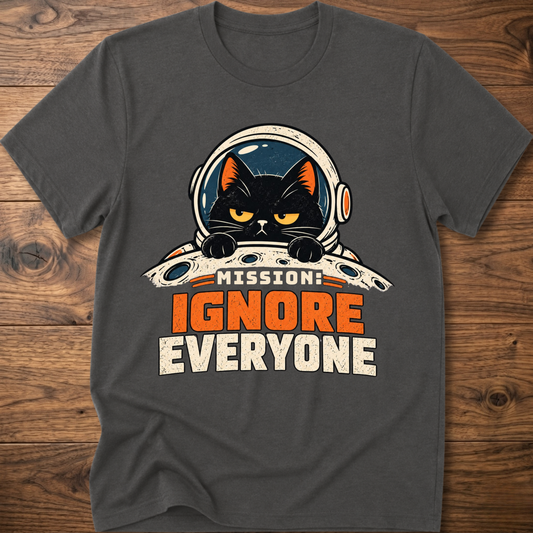 Charcoal T-shirt with cat astronaut 'Mission Ignore Everyone' graphic.