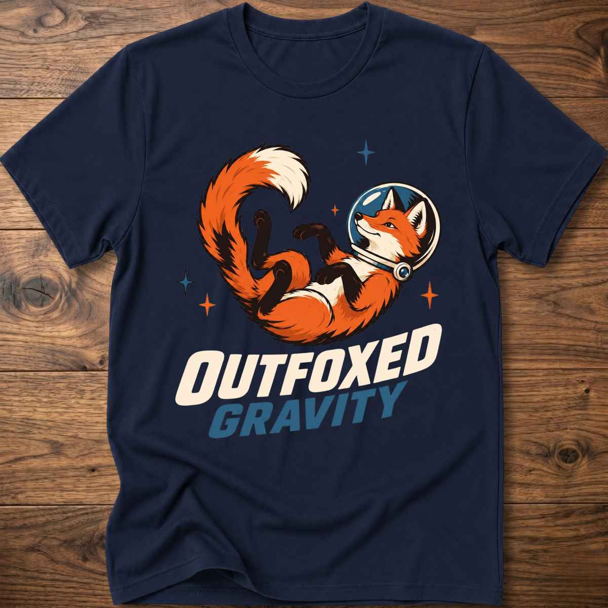 Outfoxed Gravity T-shirt in navy with orange fox gravity graphic and logo text