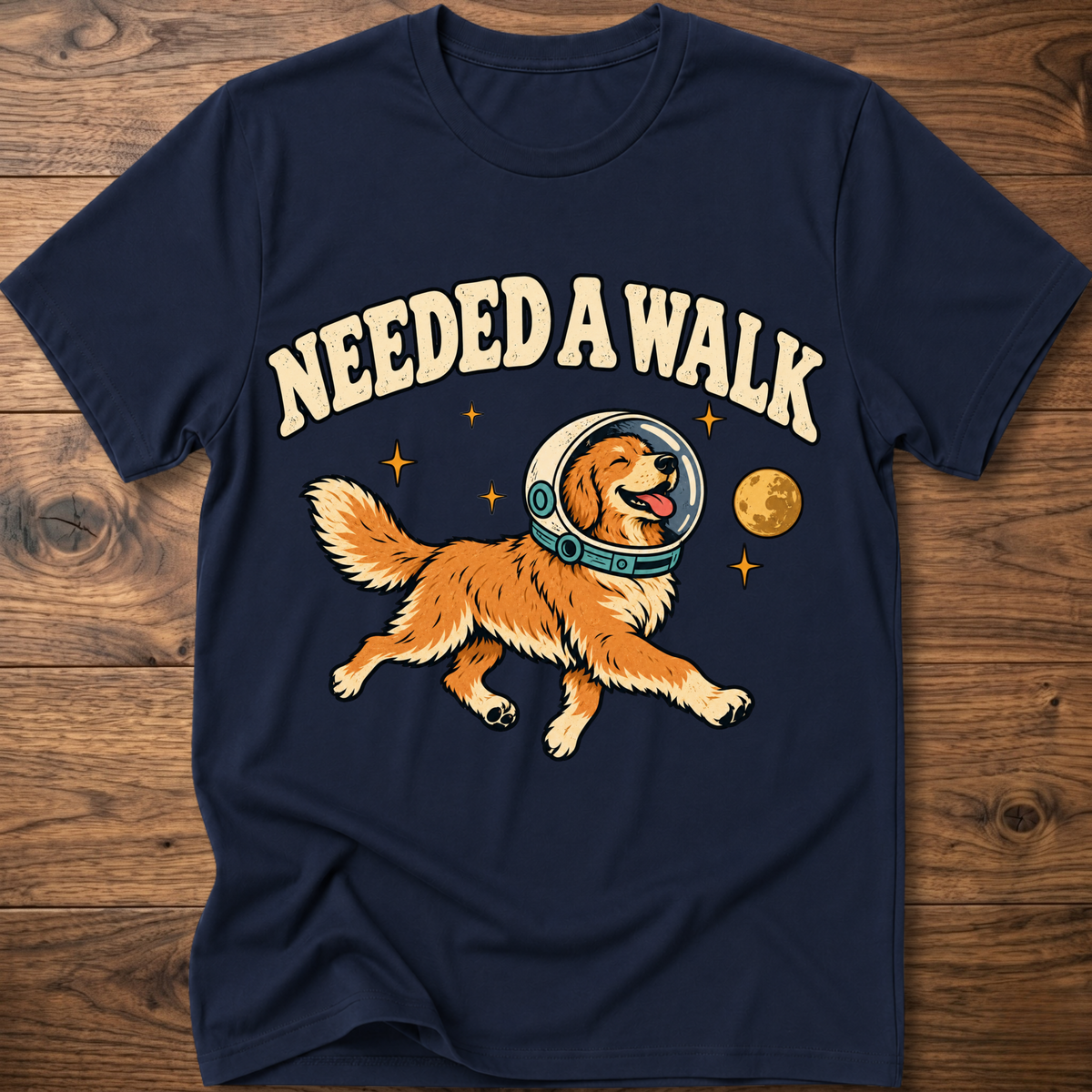 Navy T-shirt with “Needed A Walk” dog-in-helmet graphic on front