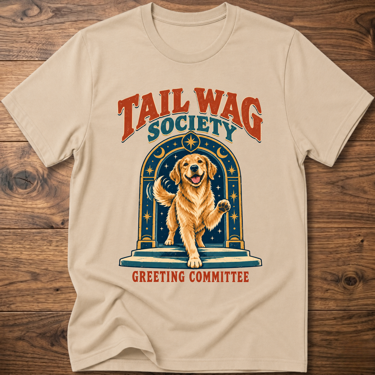 Beige T-shirt with front dog graphic and Greeting Committee text