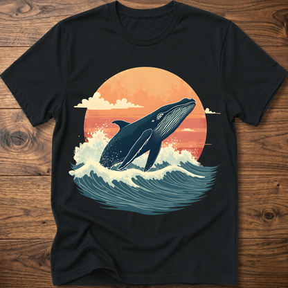 Black whale graphic t-shirt with ocean waves and sunset circle print