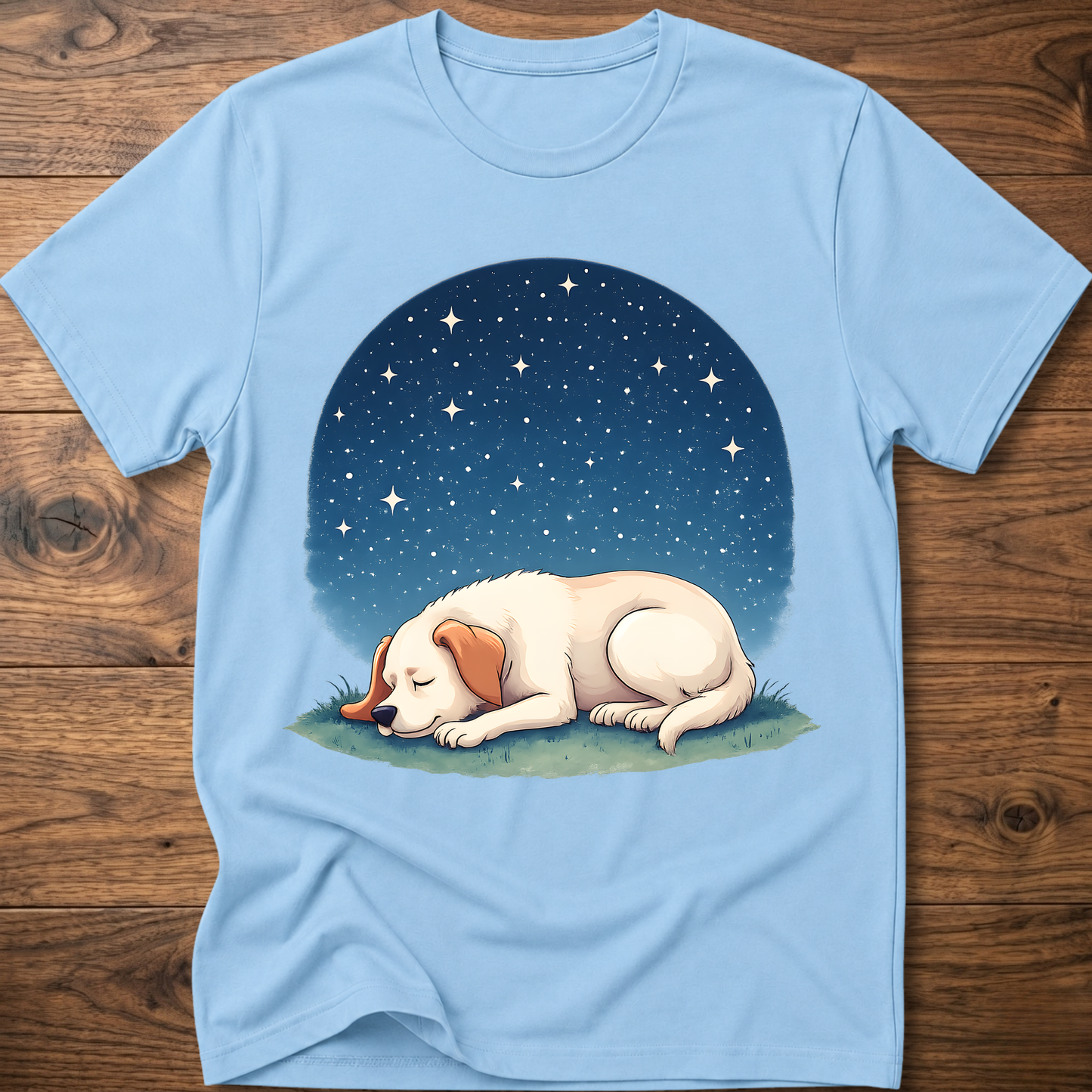 Light blue t-shirt with sleeping dog graphic under a starry night sky