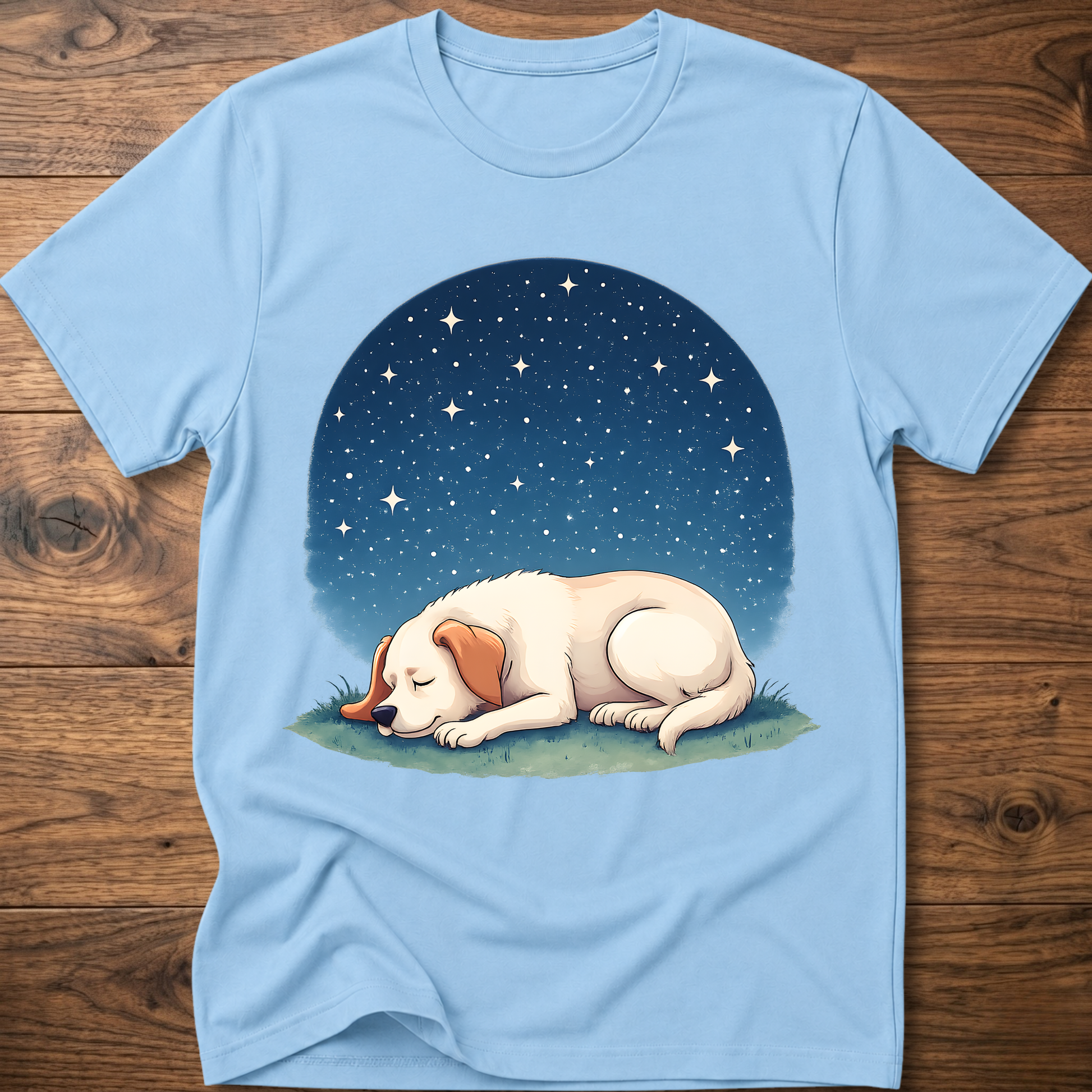 Light blue t-shirt with sleeping dog graphic under a starry night sky