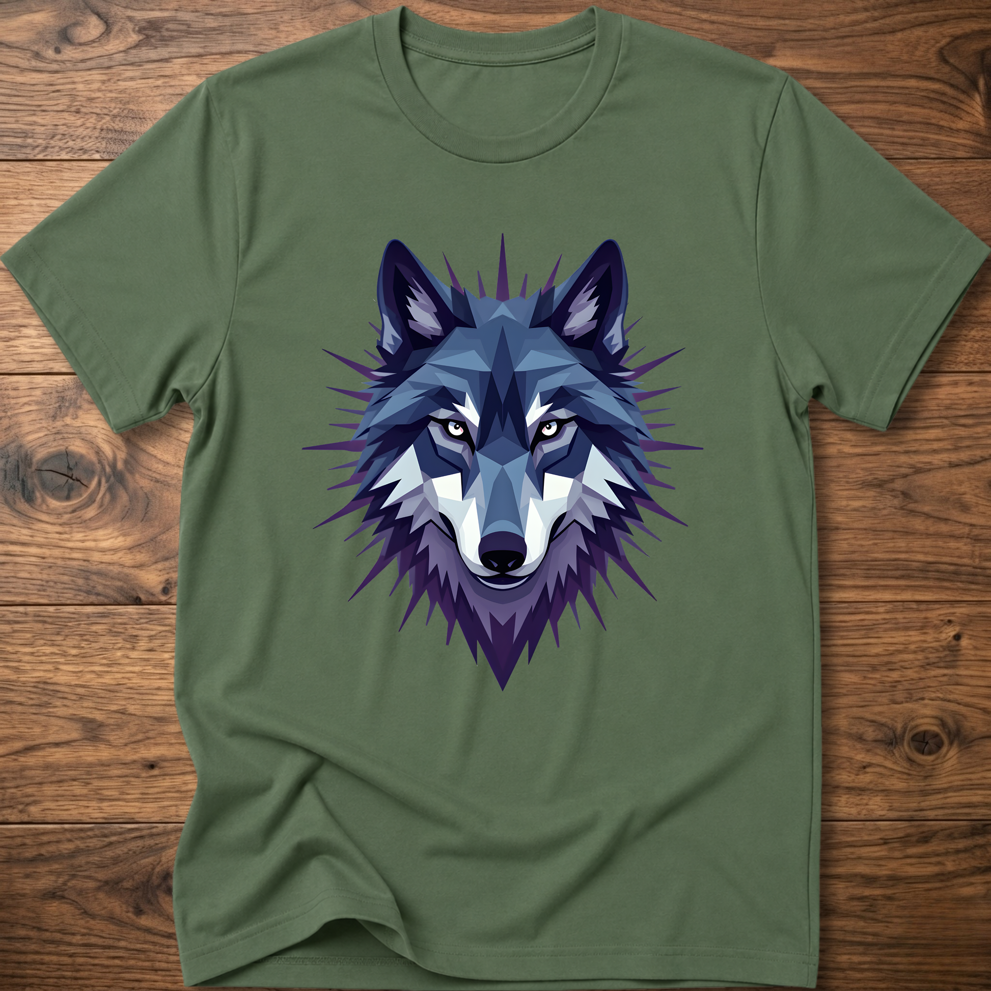 Olive green t-shirt with blue starry geometric wolf head graphic on the front