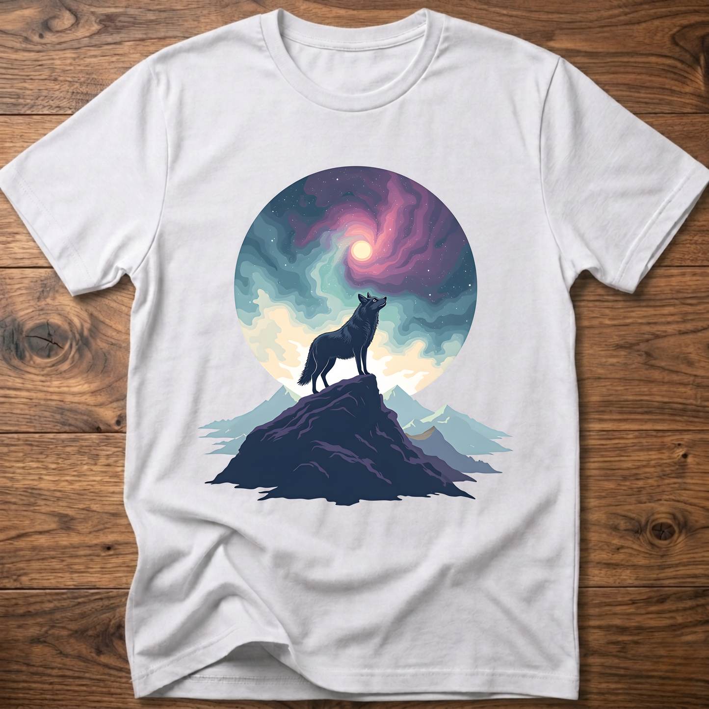 White graphic t-shirt with wolf silhouette on mountain under a colorful moon