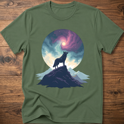 Dark green graphic t-shirt with wolf silhouette on mountain beneath a colorful moon