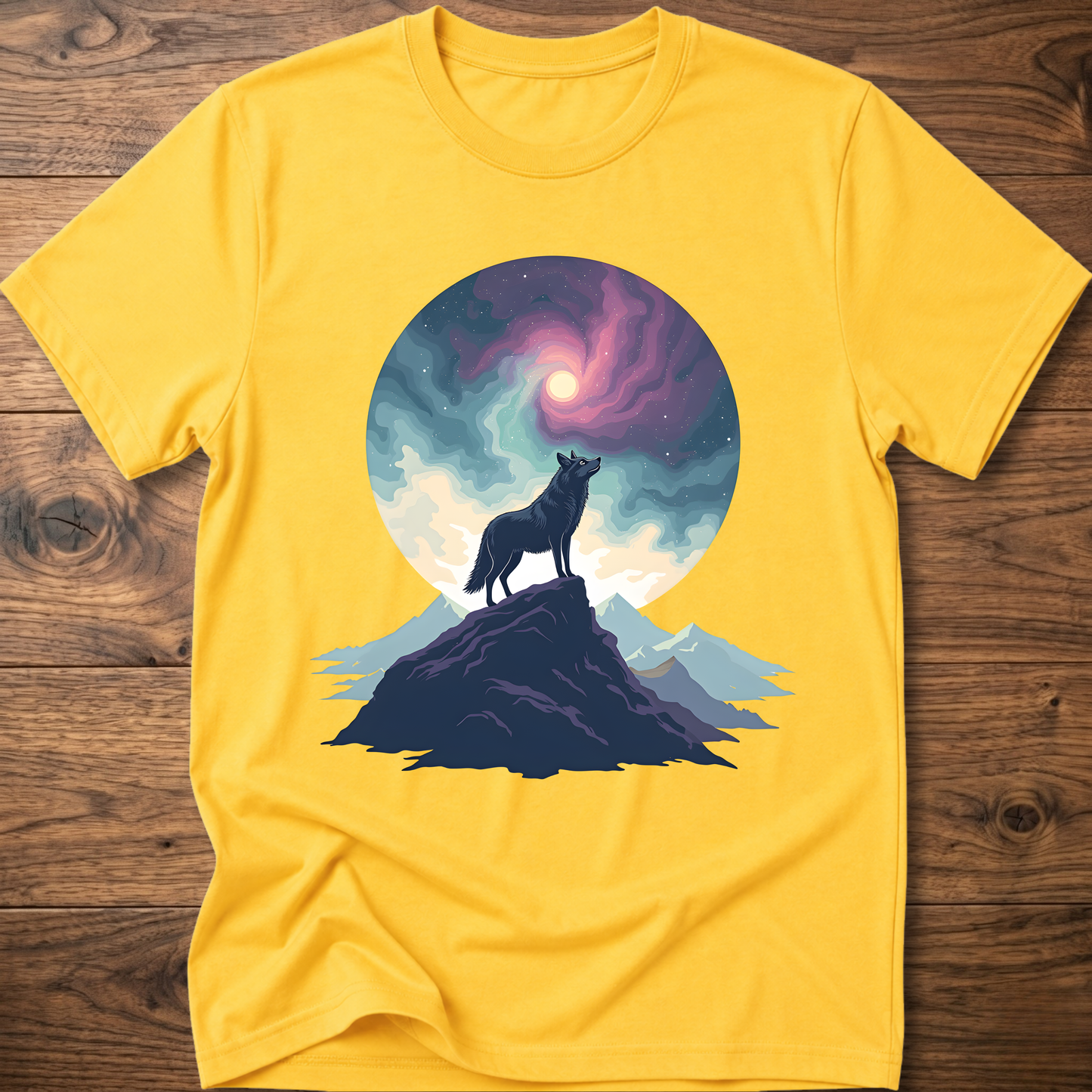 Yellow graphic t-shirt with wolf silhouette on mountain beneath a glowing moon circle