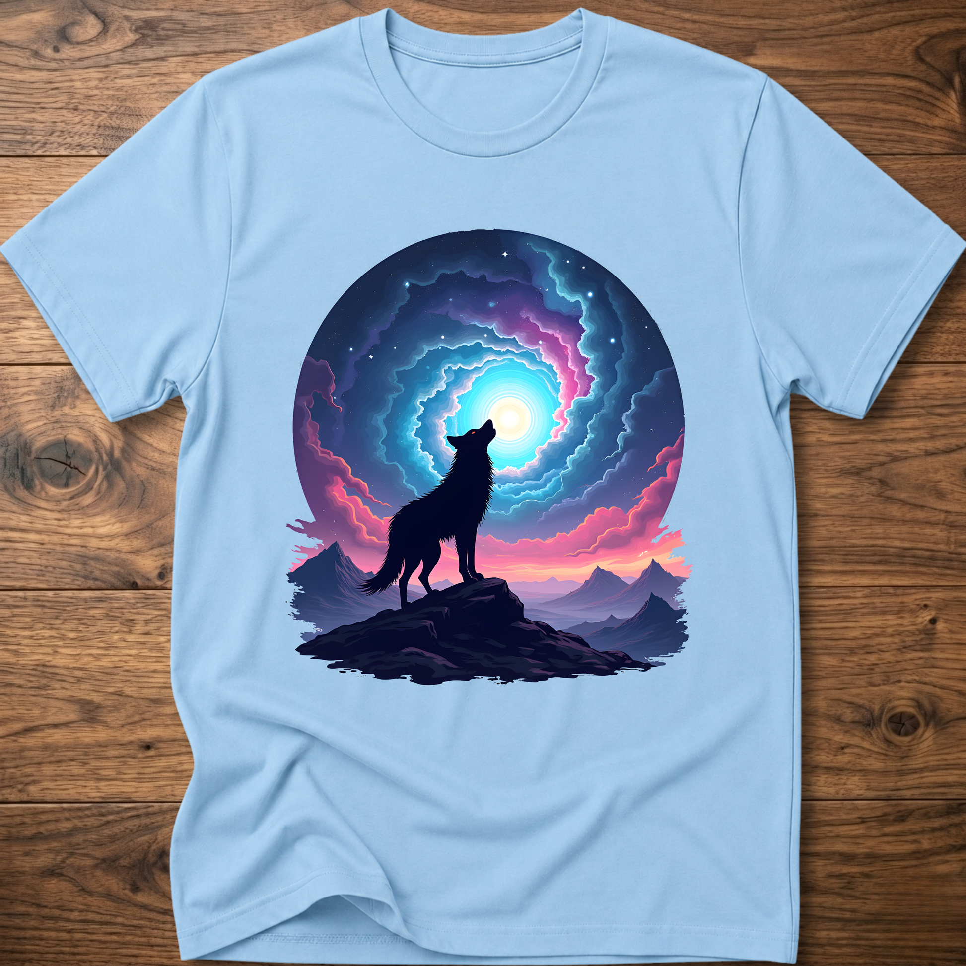 Light blue graphic t-shirt with dark wolf silhouette on cliff near glowing portal