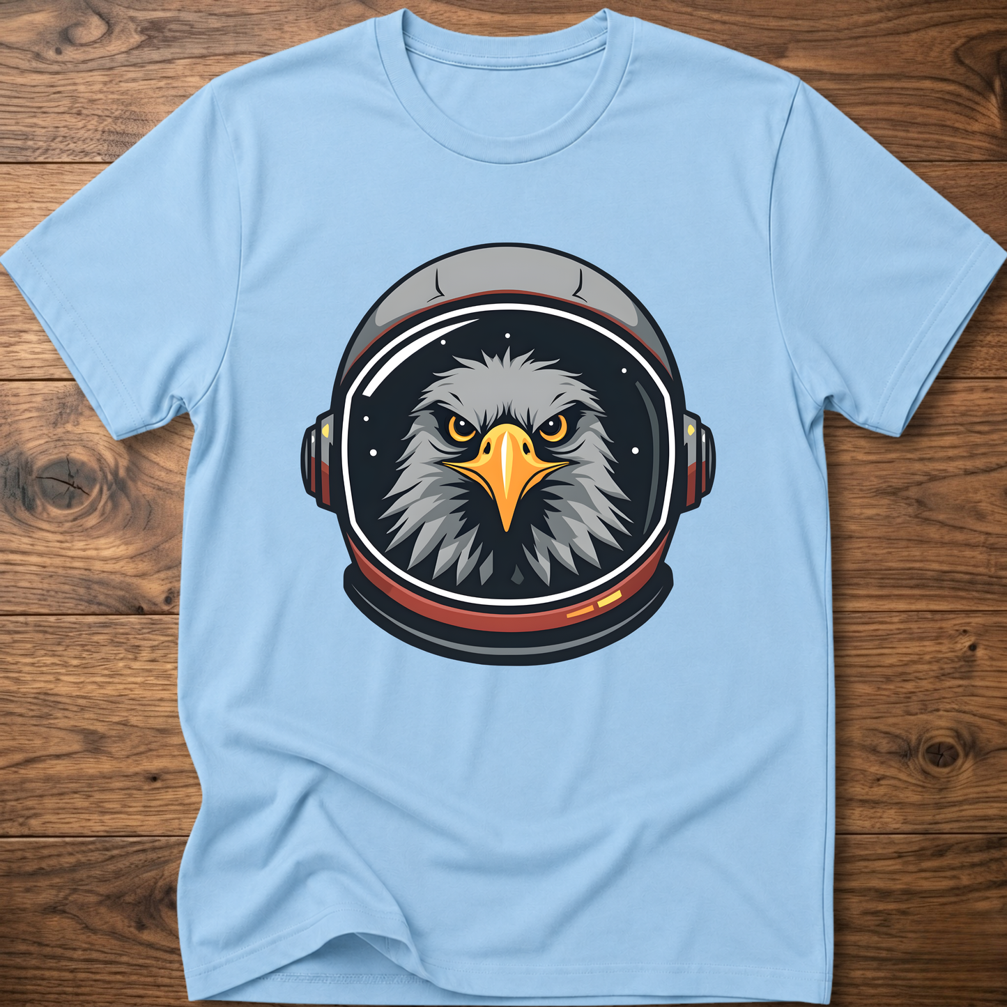 Light blue crew-neck t-shirt with eagle astronaut head graphic on chest