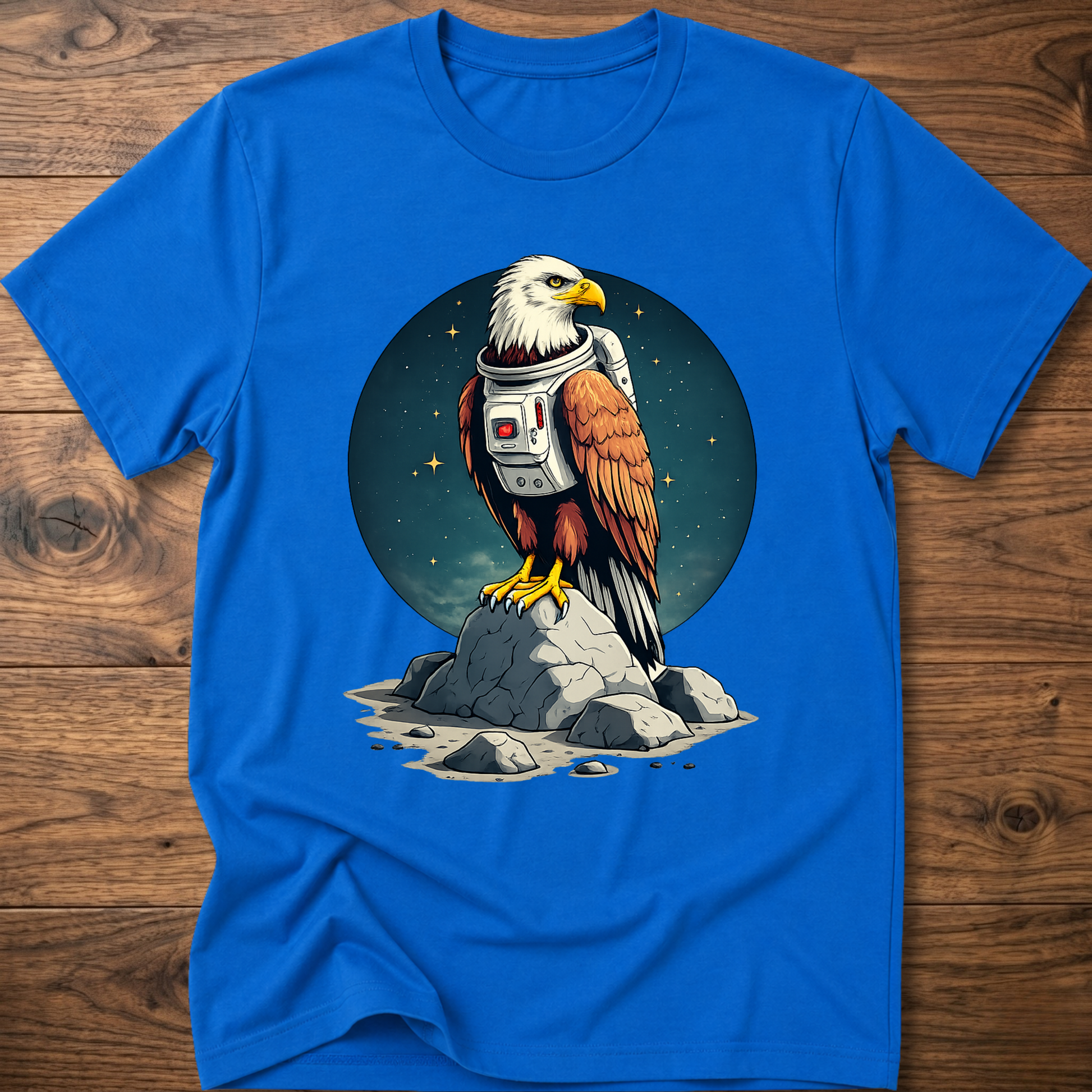 Royal blue T-shirt with astronaut-eagle graphic on dark circular space emblem