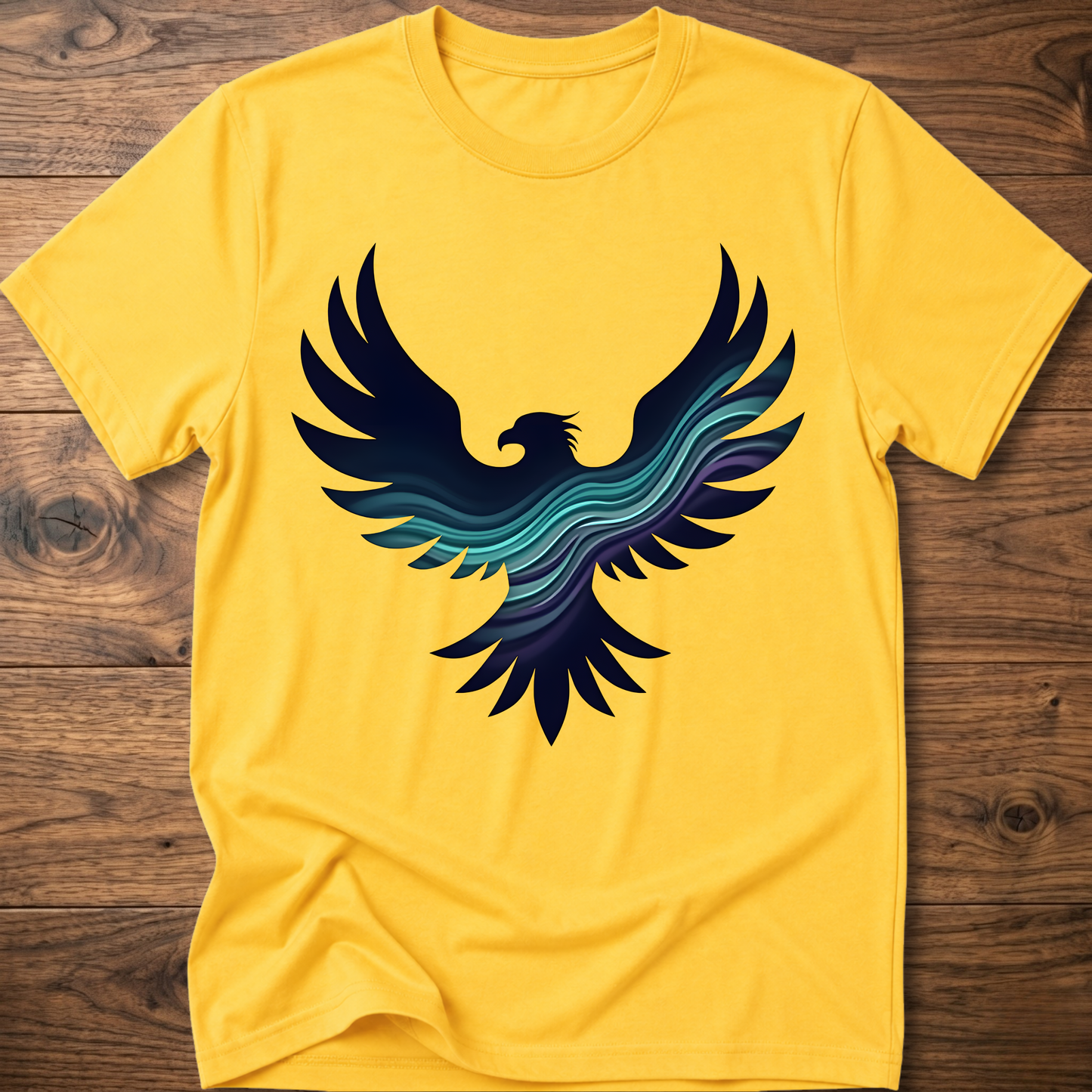 Yellow crew-neck T-shirt with large phoenix-style eagle graphic in navy and teal