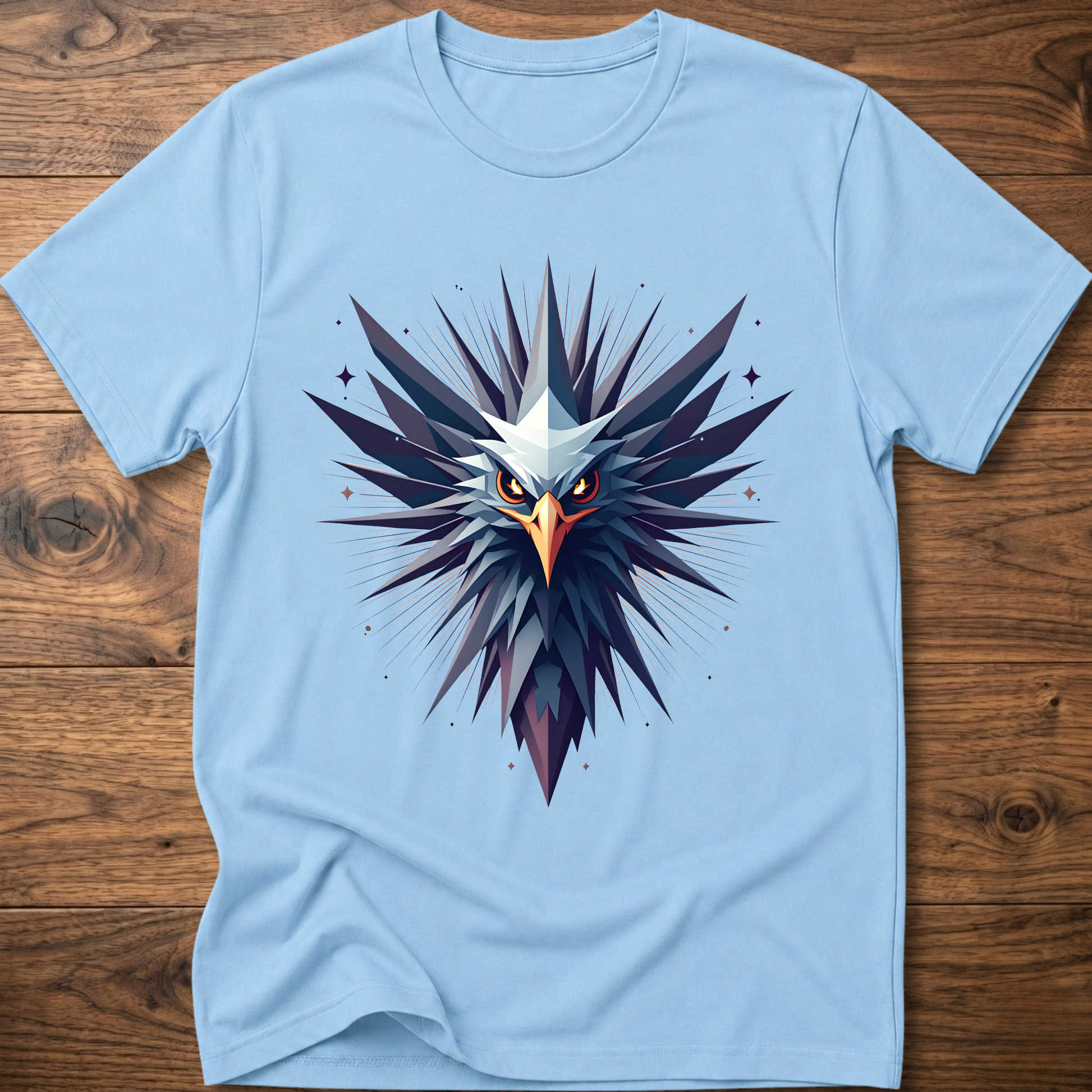 Light blue crew-neck t-shirt with geometric eagle graphic in blue and orange