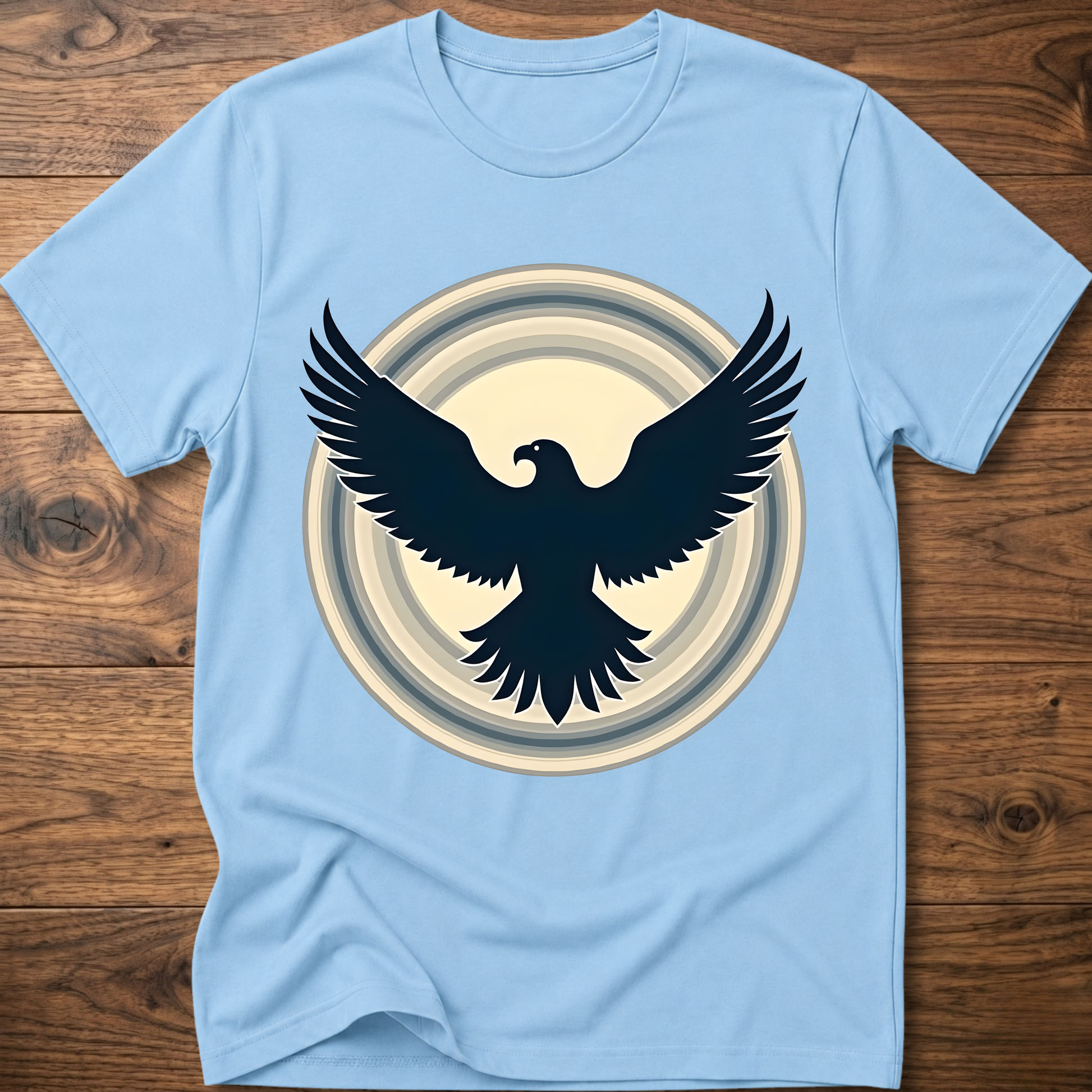 Light blue crewneck T-shirt with dark eagle and circular graphic print
