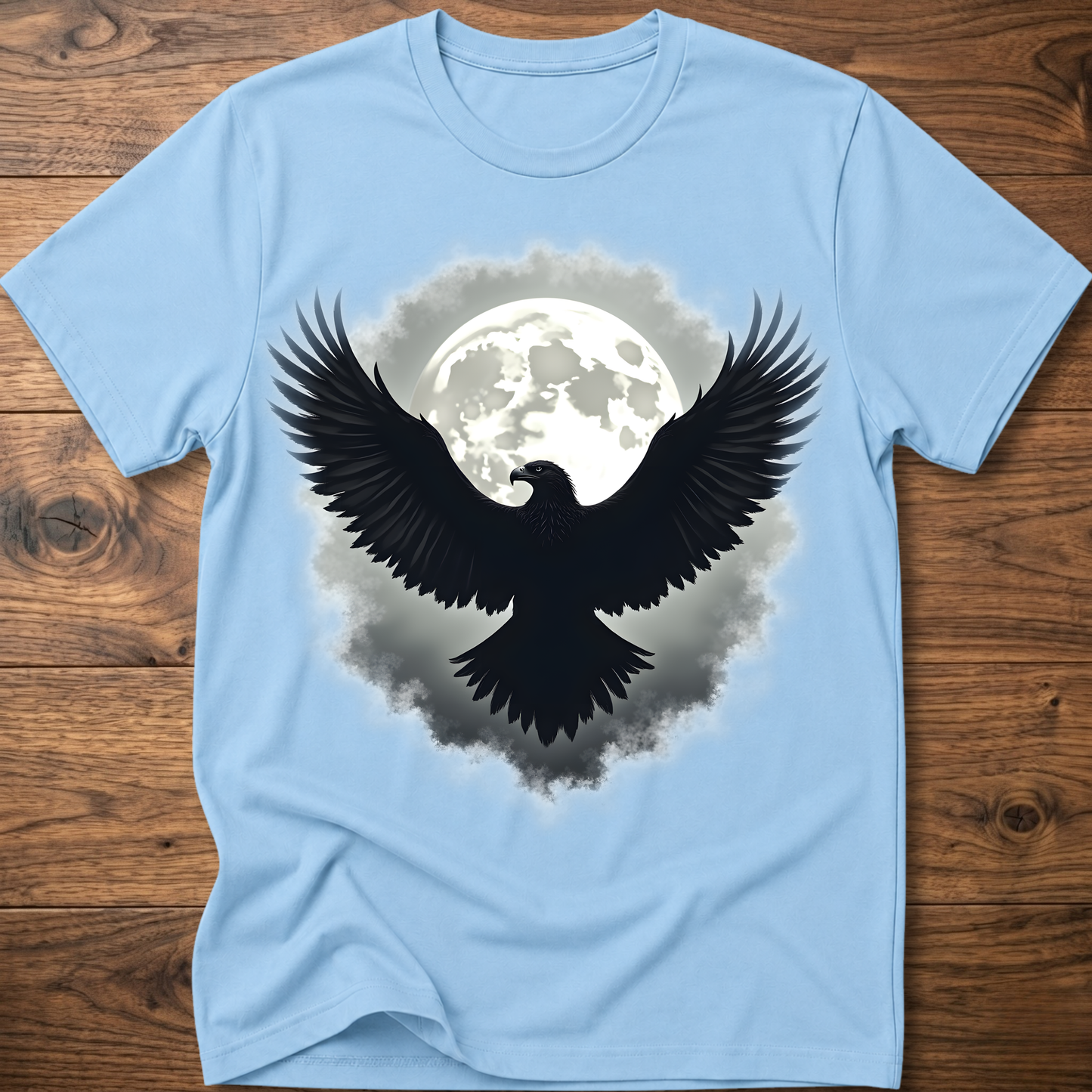 Light blue crewneck t-shirt with large eagle and moon graphic on chest