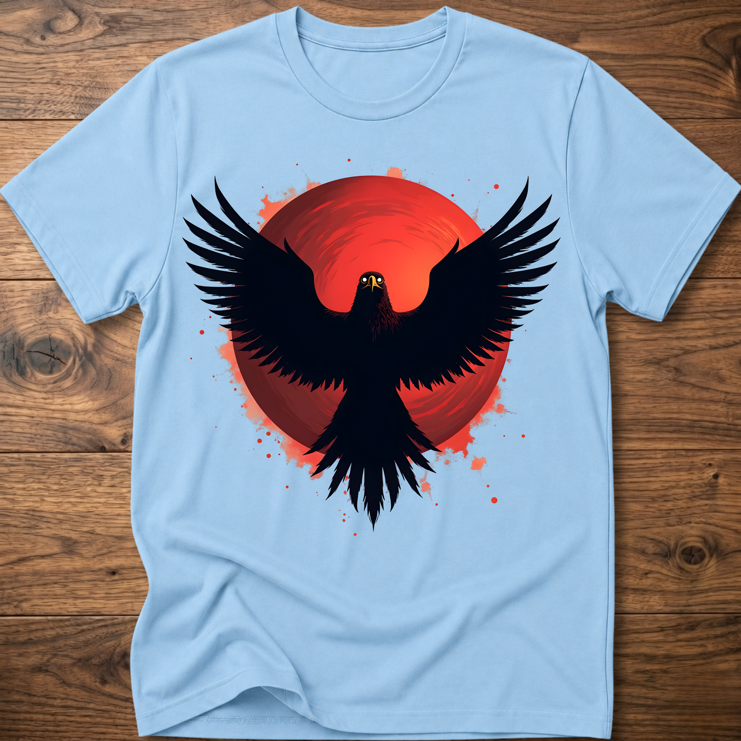 Light blue crew-neck t-shirt with red eagle graphic and black wings