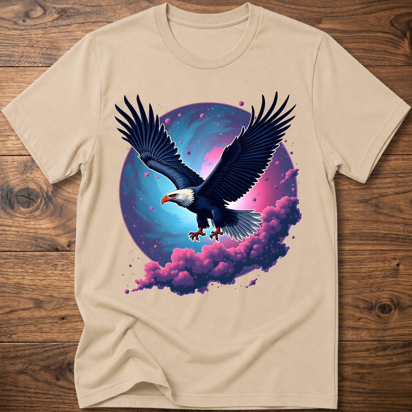 Sand-colored eagle T-shirt with galaxy wing art and pink-purple clouds on front
