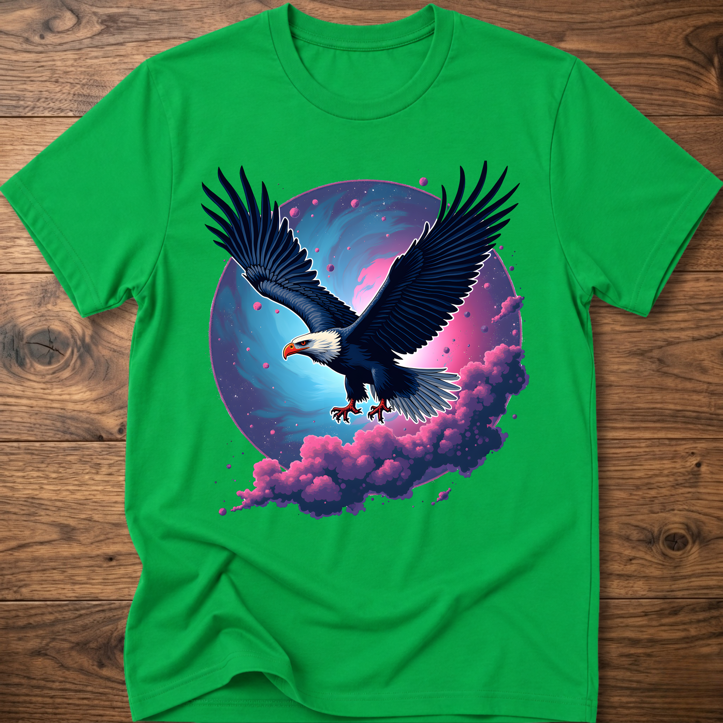 Green eagle T-shirt with galaxy wing art and pink-purple clouds on front