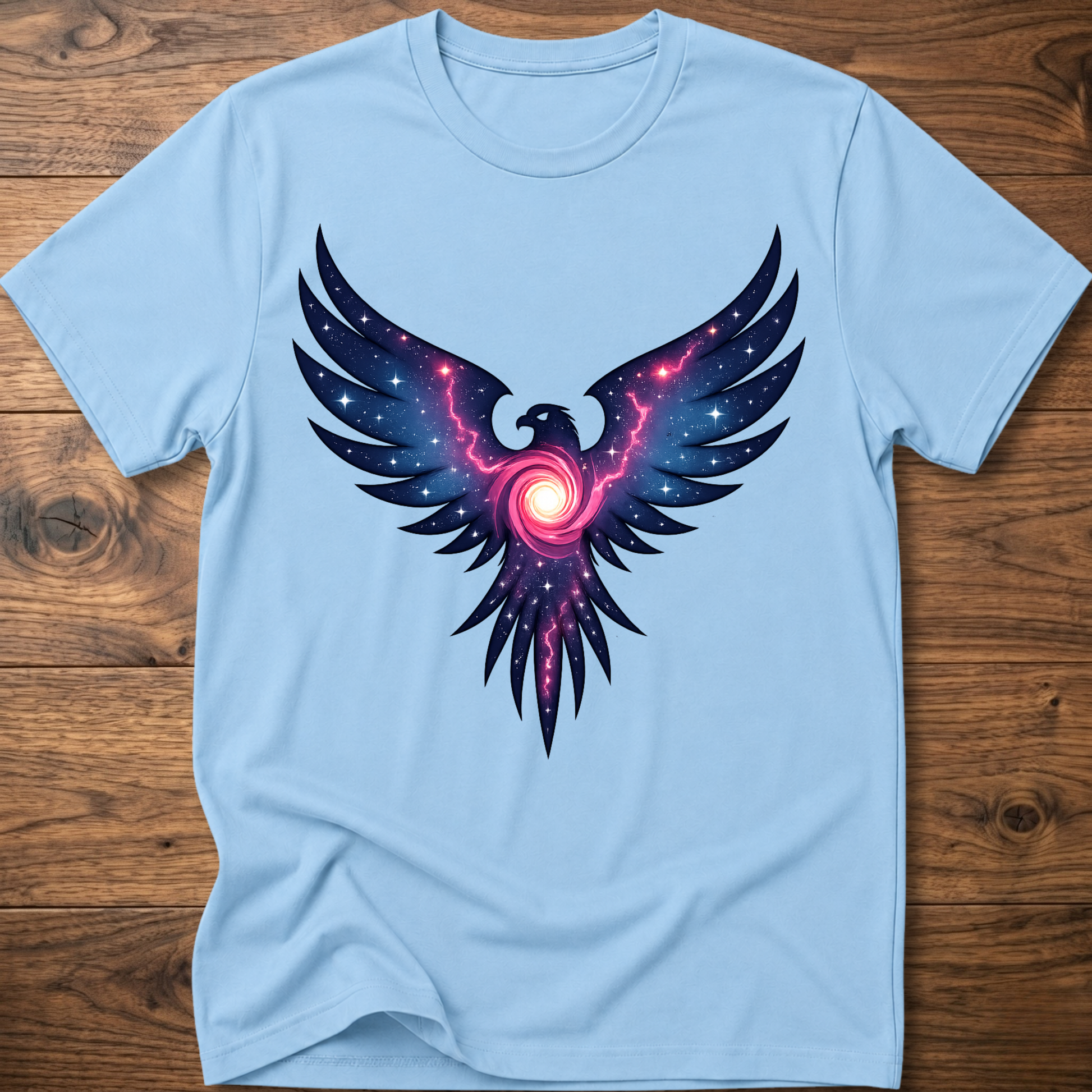 Light blue crew-neck t-shirt with colorful galaxy eagle graphic centered on chest
