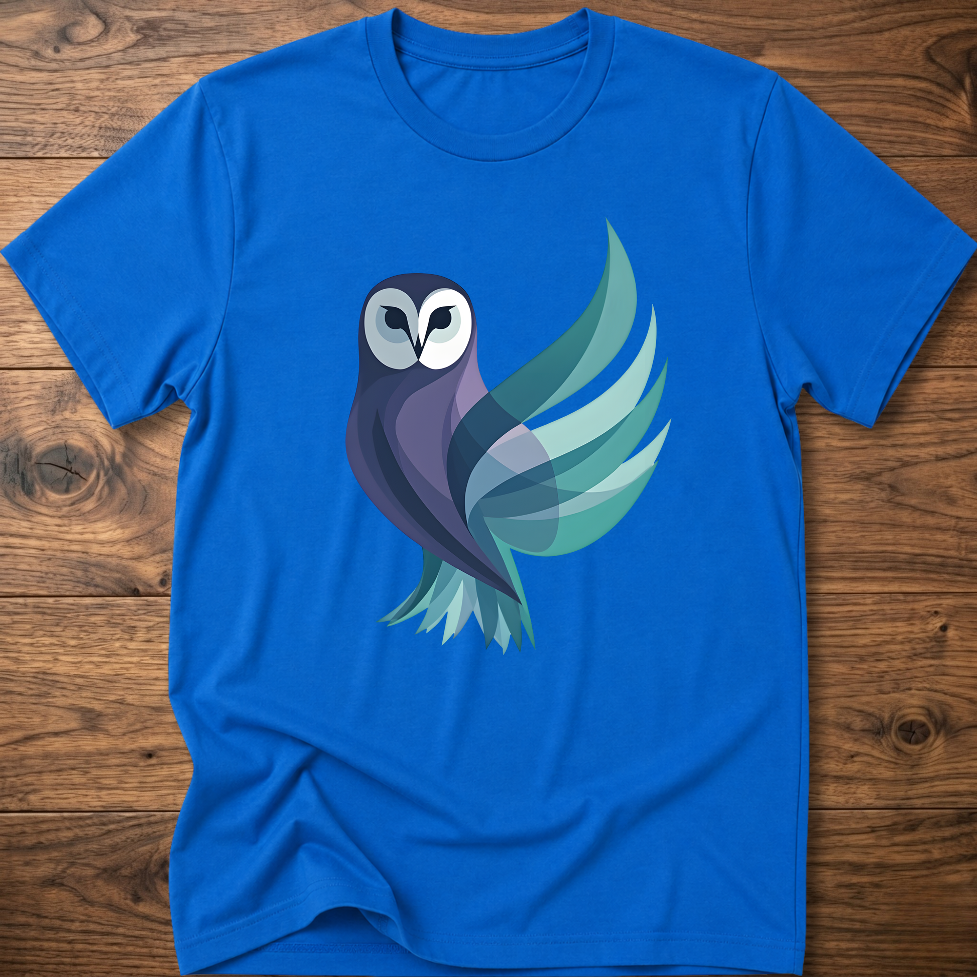 Royal blue T-shirt with geometric owl graphic on the front