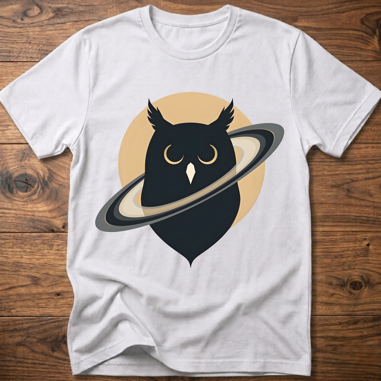 White t-shirt with black owl and planet graphic on the front