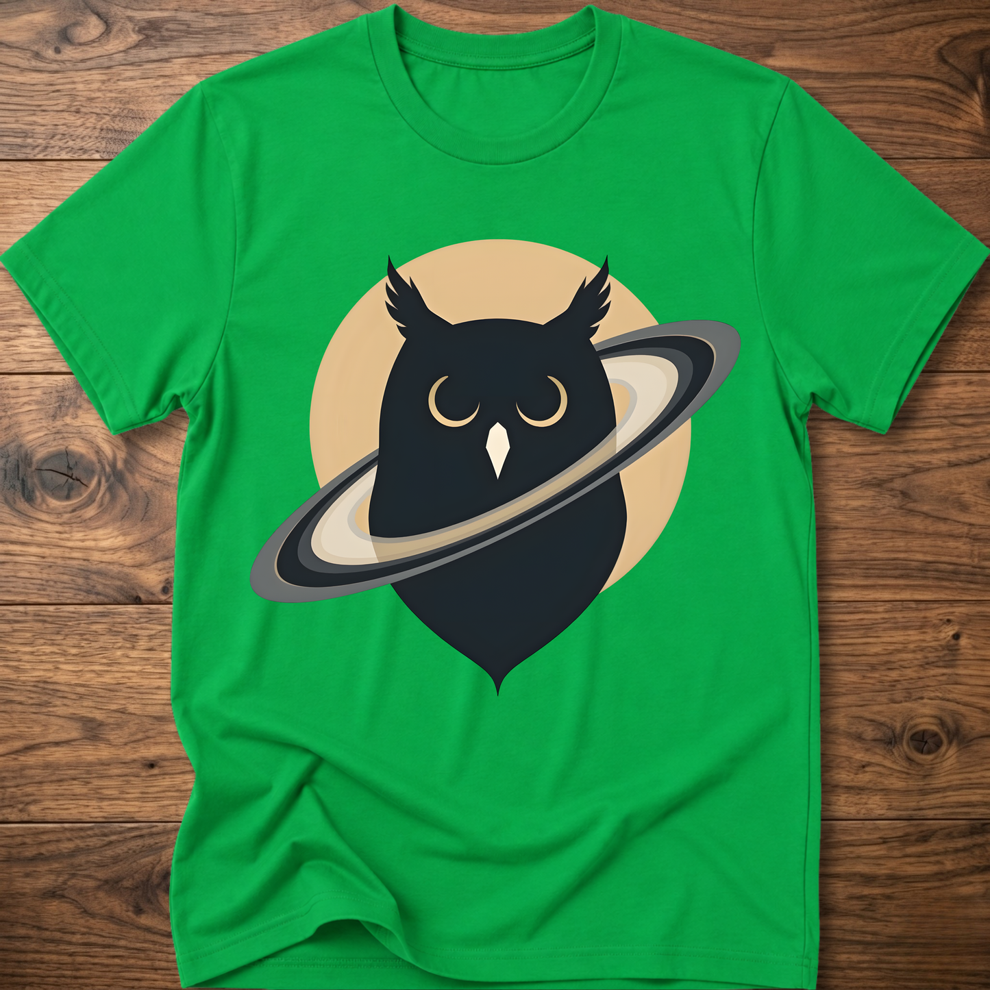Bright green t-shirt with black owl and planet graphic on the front