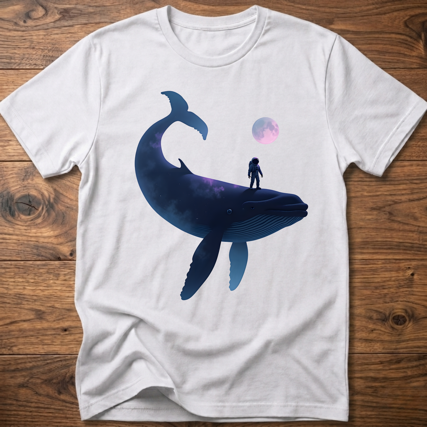 White T-shirt with astronaut riding dark whale graphic and small planet print