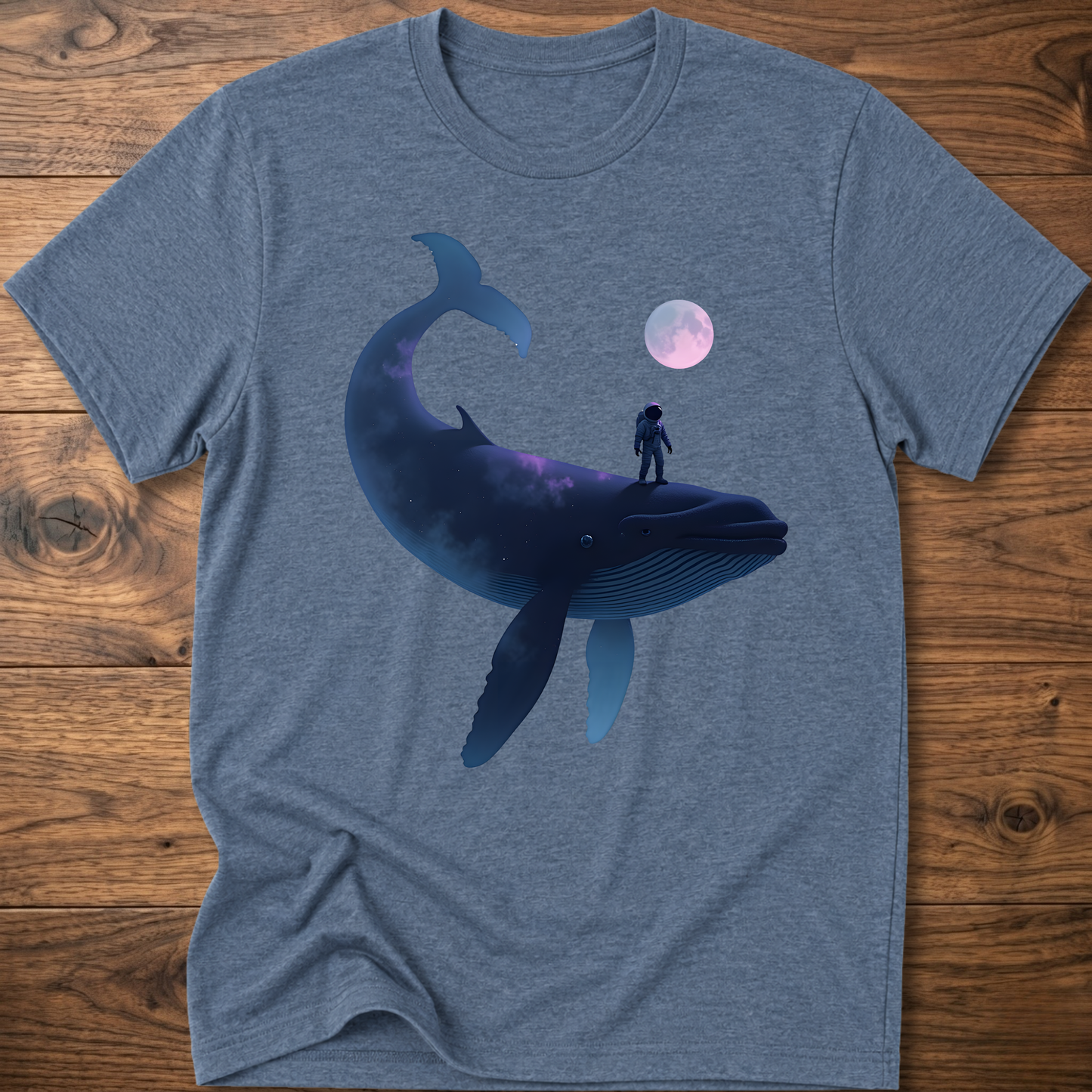 Blue heather T-shirt with astronaut riding dark whale graphic and small planet print