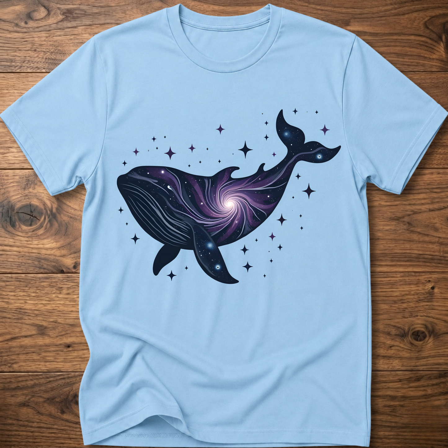Light blue graphic whale T-shirt with starry galaxy print