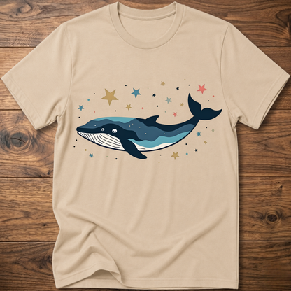 Beige whale graphic t-shirt with colorful starry constellation print