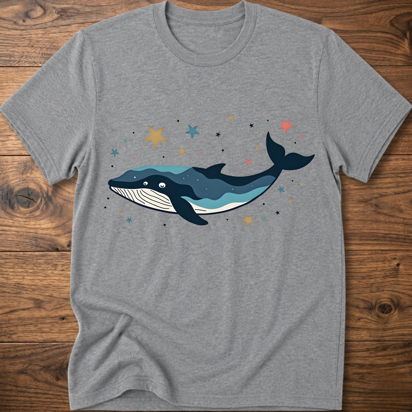 Light gray whale graphic t-shirt with colorful starry constellation print