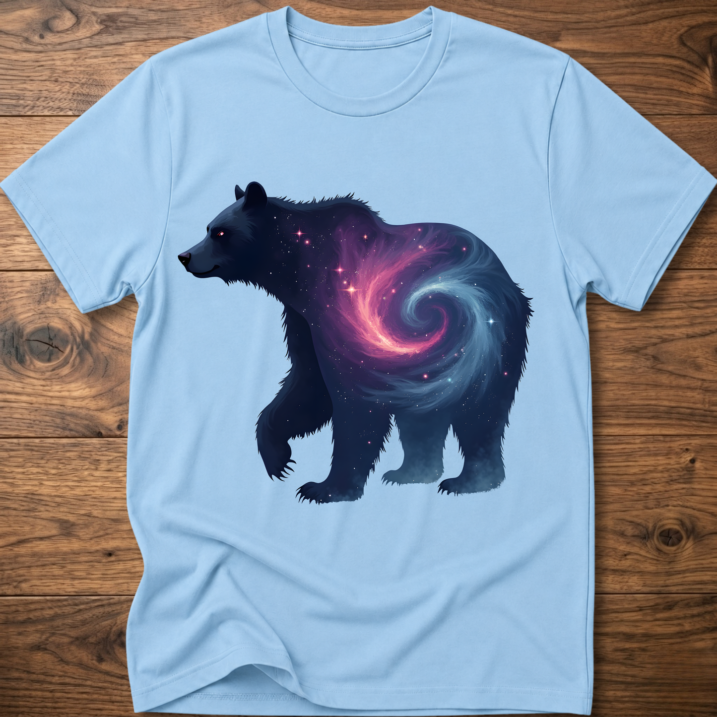 Light blue graphic bear T-shirt with galaxy swirl artwork