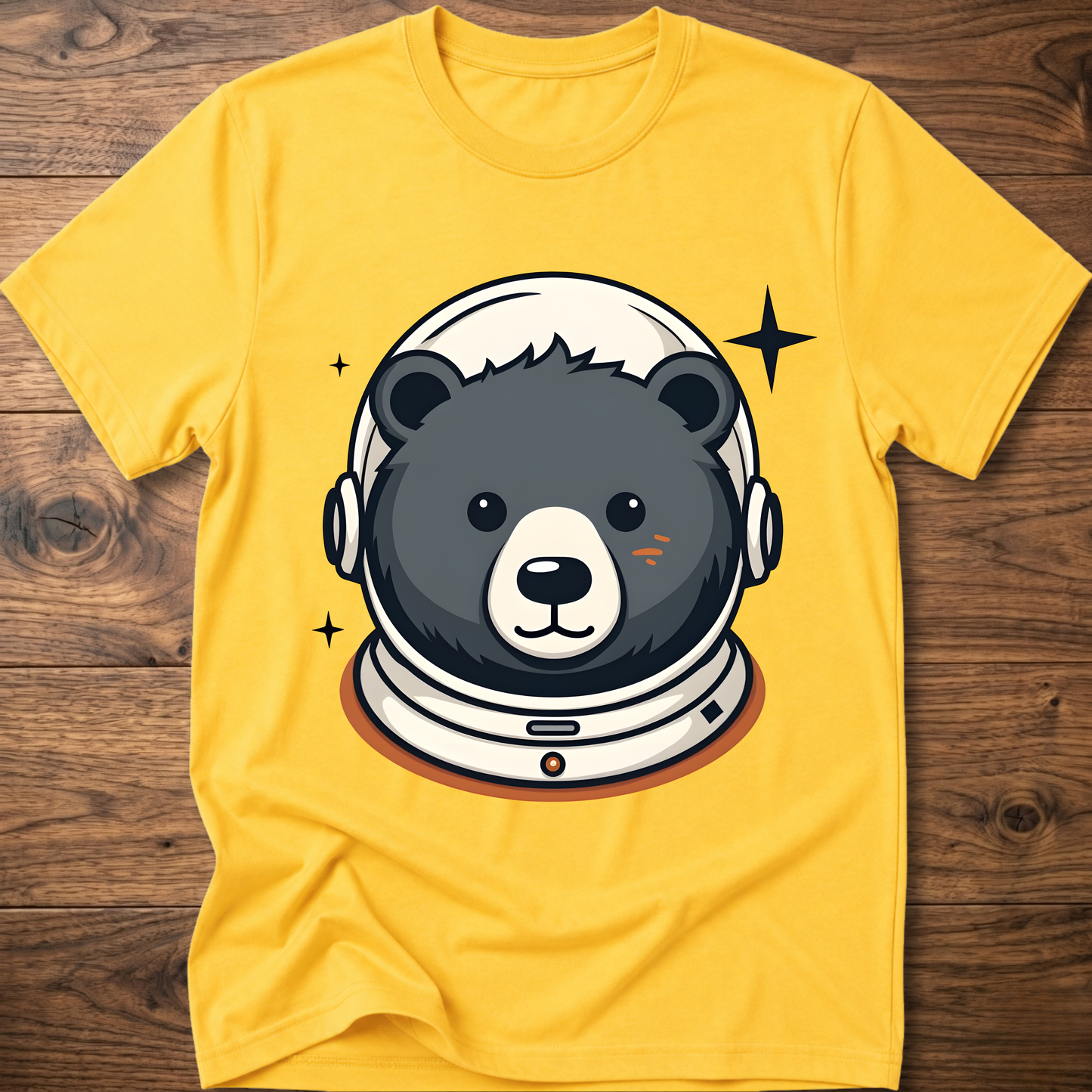 Yellow T-shirt with astronaut teddy bear graphic wearing a space helmet