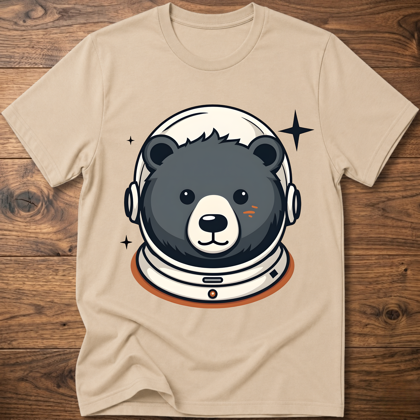 Beige T-shirt with astronaut teddy bear graphic in a space helmet