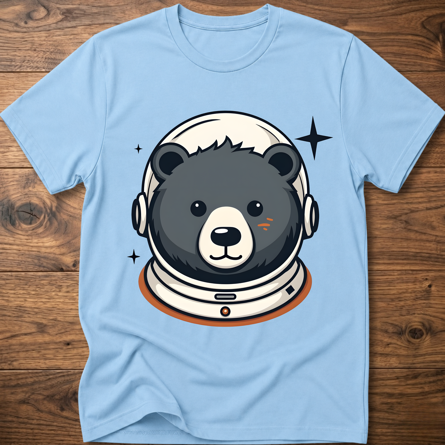 Light blue T-shirt with astronaut teddy bear head graphic and helmet