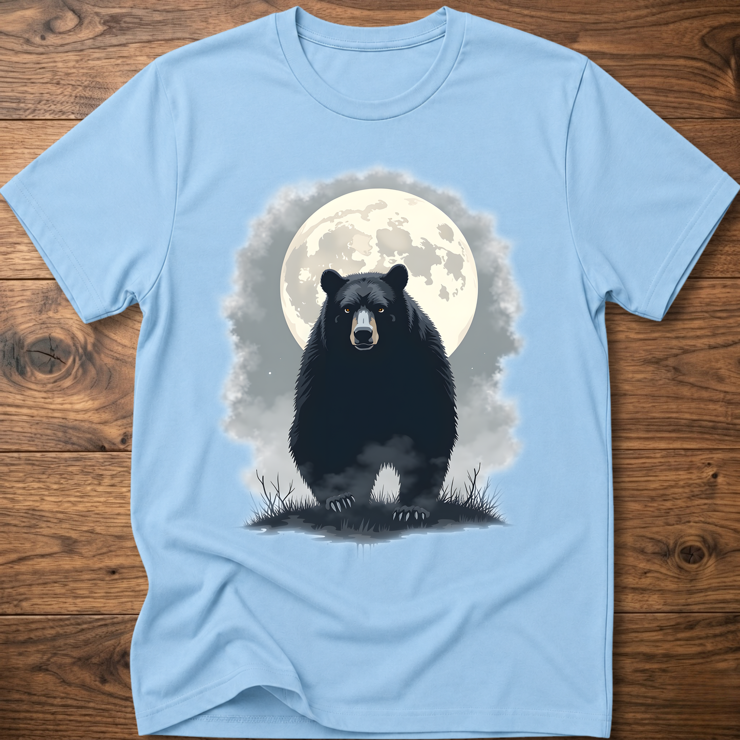 Light blue crewneck T-shirt with black bear under moon graphic in front