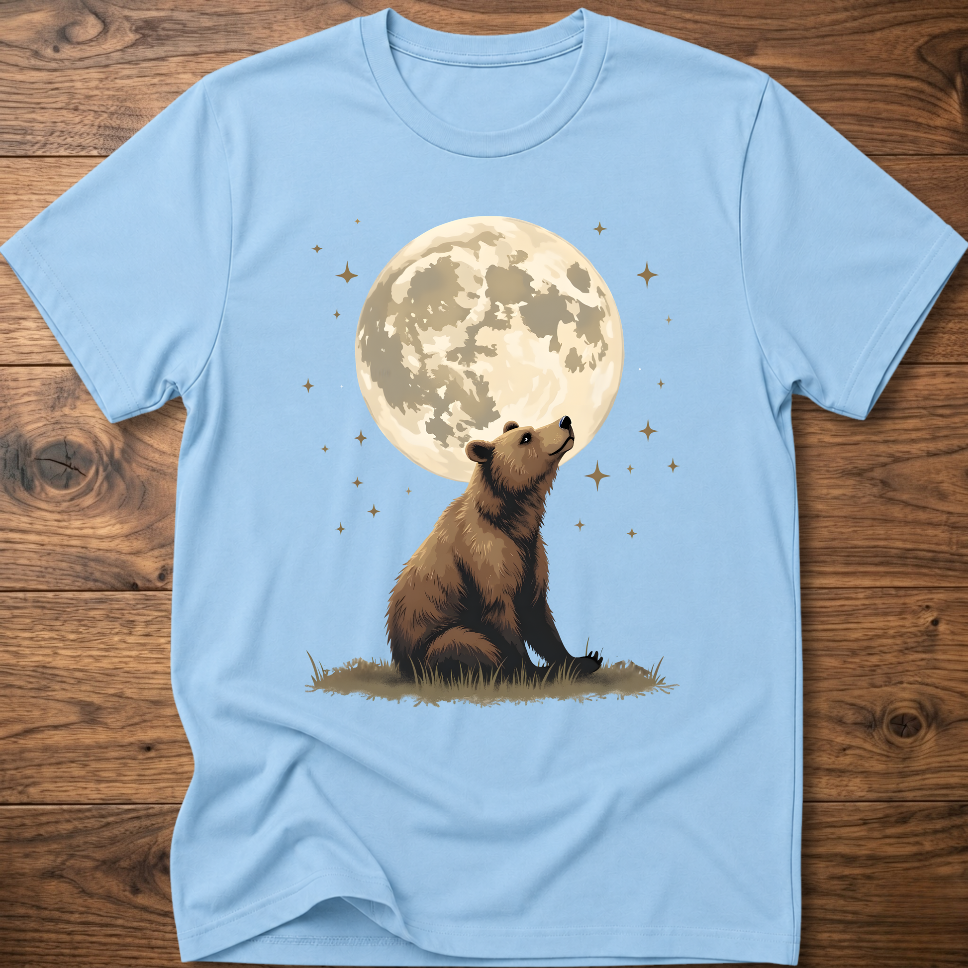 Light blue t-shirt with large moon and standing bear graphic on the front