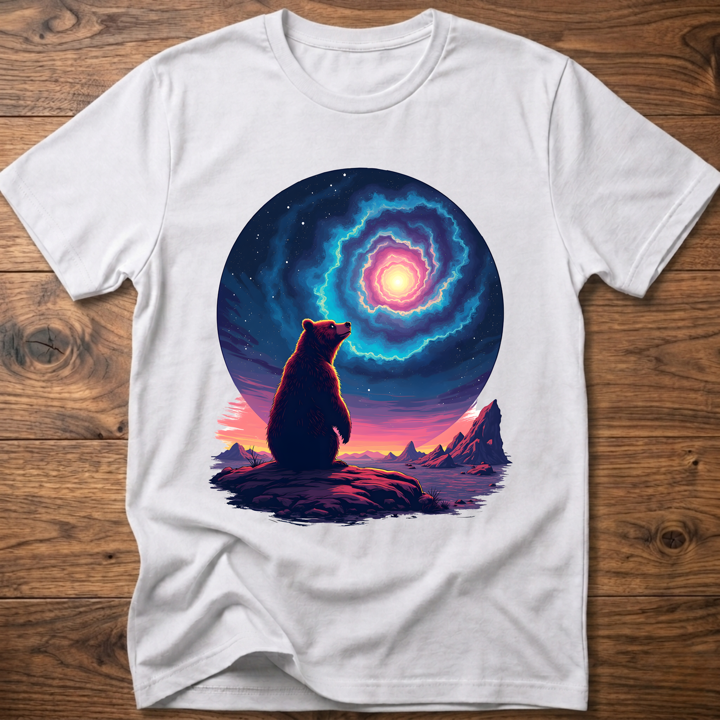 White T-shirt with galaxy bear graphic and glowing ring portal above a dark landscape