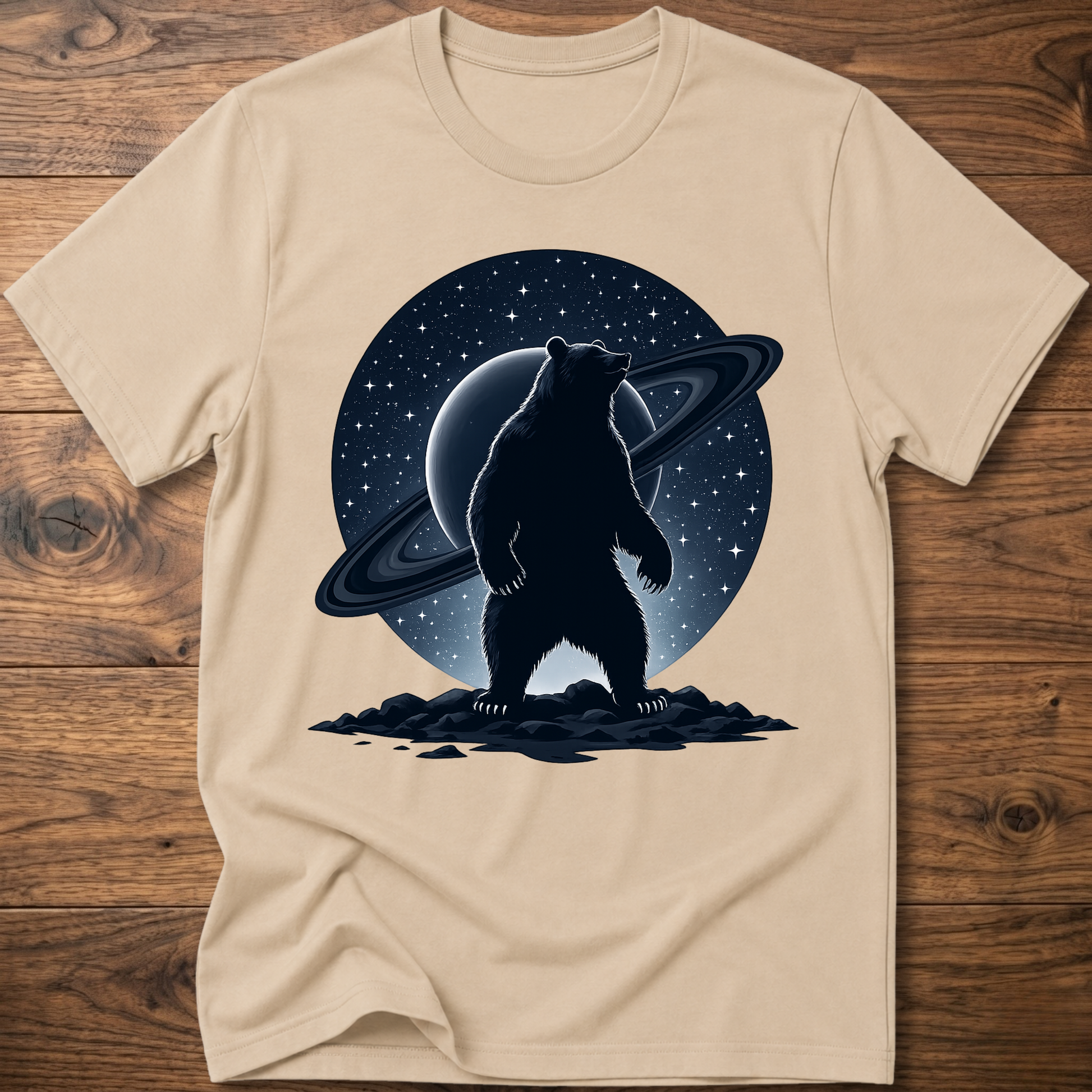 Sand/beige T-shirt with black Saturn bear graphic on the front