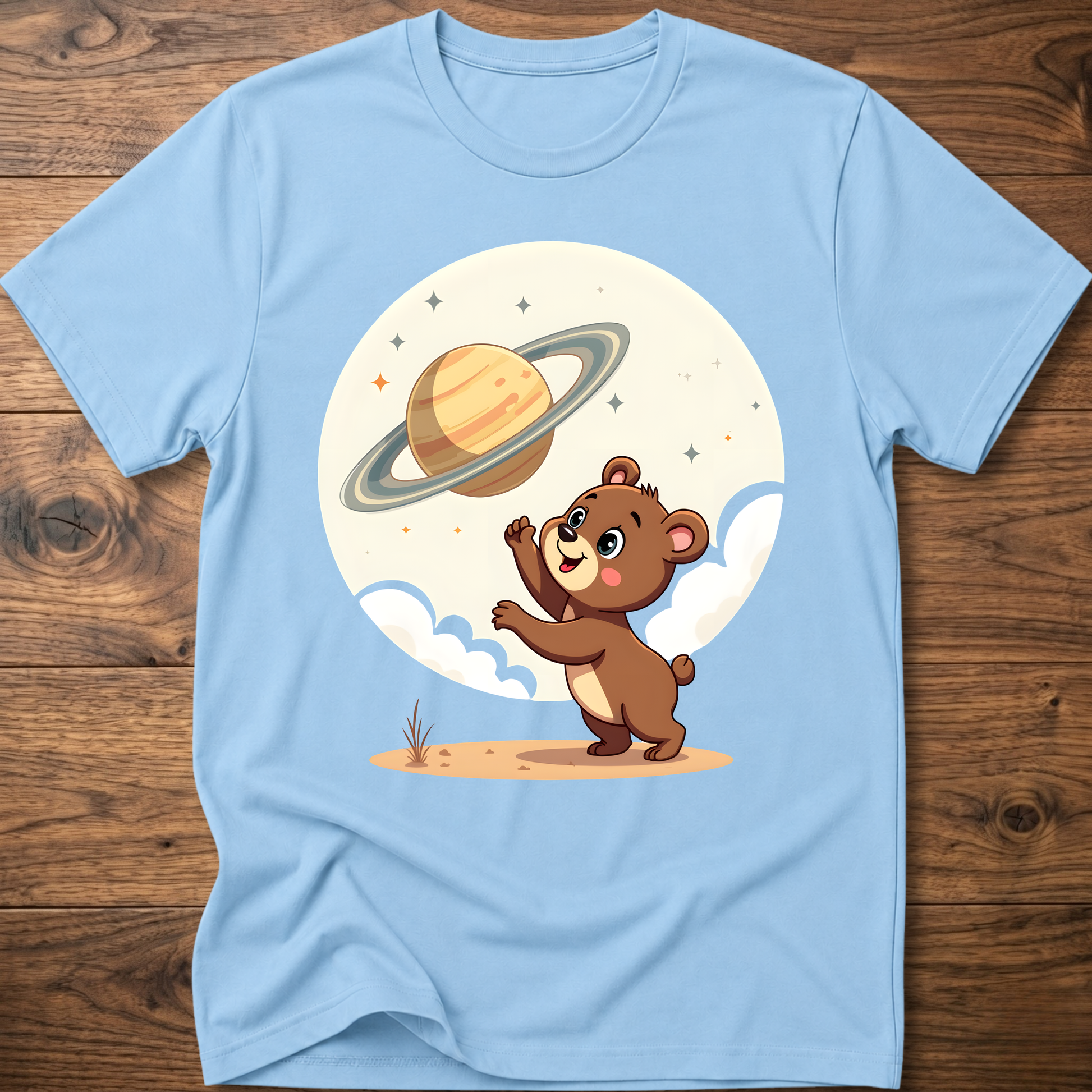 Light blue teddy bear graphic t-shirt with Saturn planet and cartoon bear on front