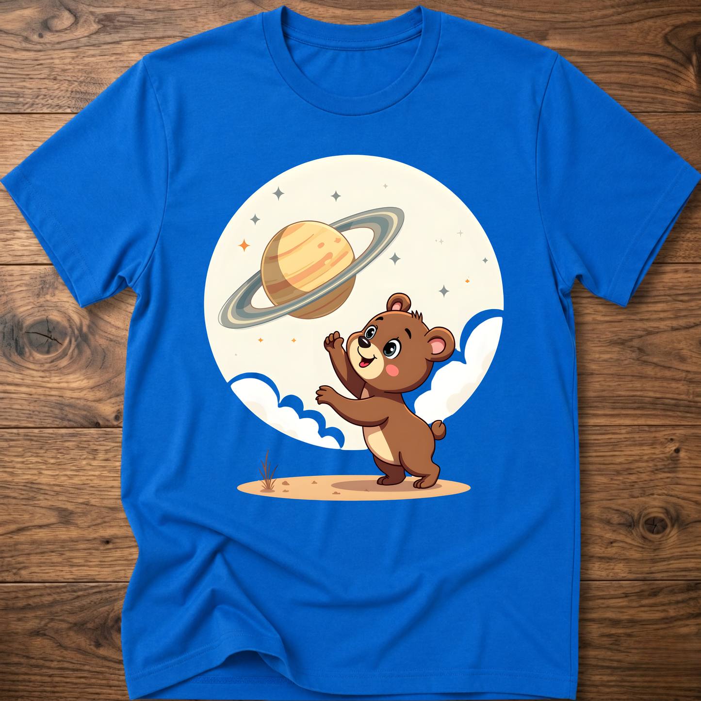 Blue teddy bear graphic t-shirt with Saturn planet and cartoon bear on front
