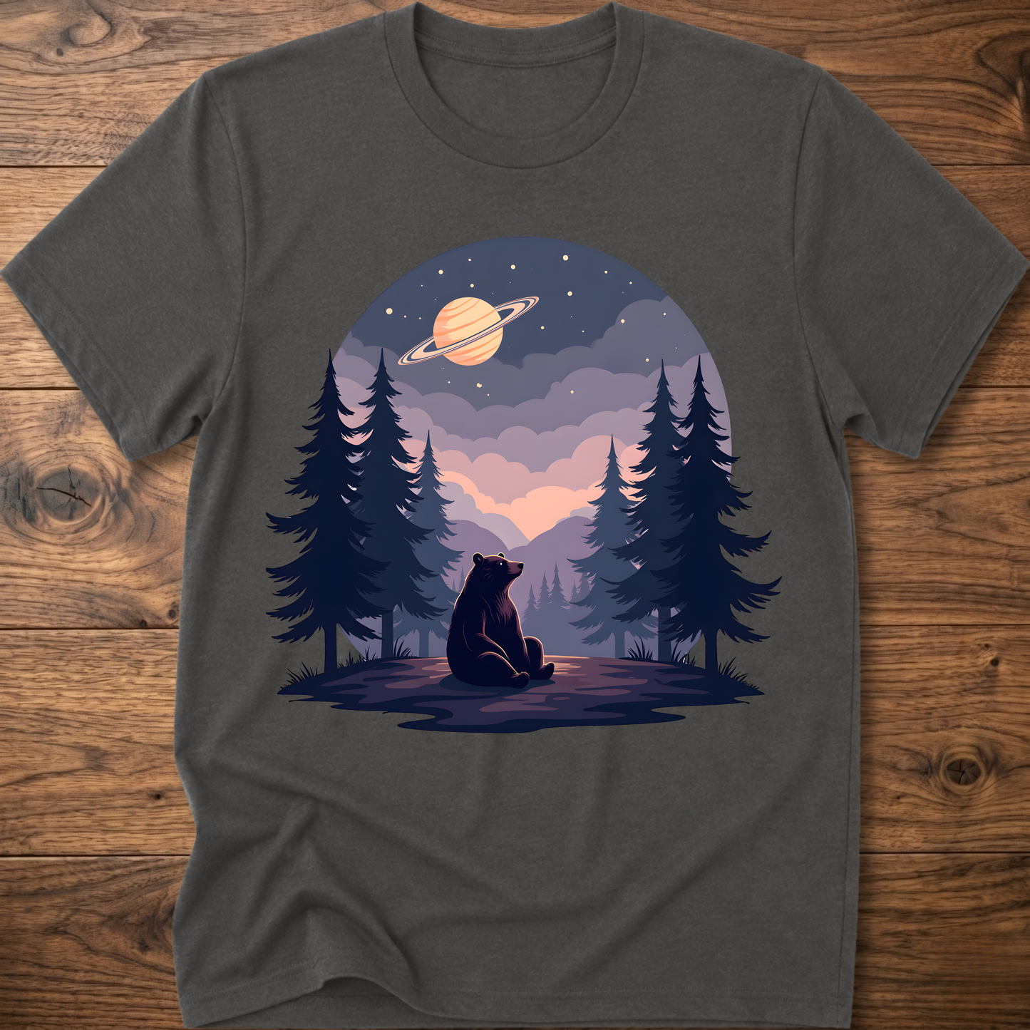 Charcoal gray t-shirt with night sky bear graphic, ringed planet and pine trees