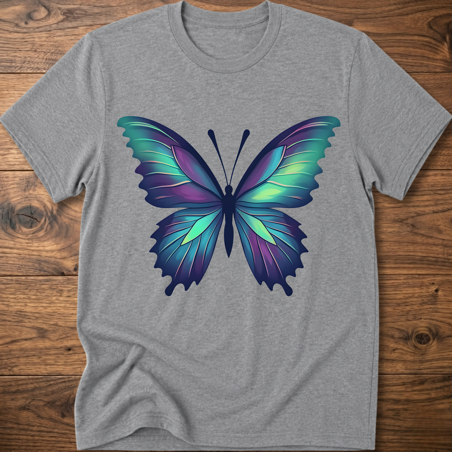 Heather gray t-shirt with colorful geometric butterfly graphic on the chest
