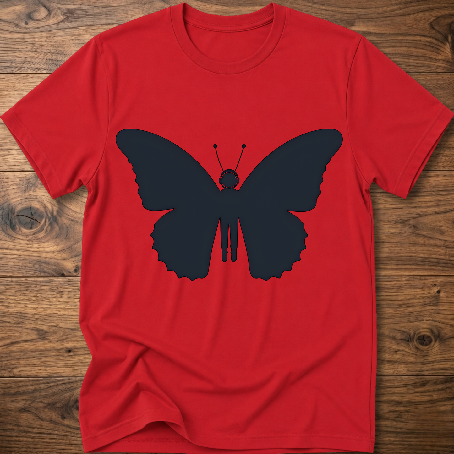 Red crewneck T-shirt with dark blue astronaut butterfly graphic on the front