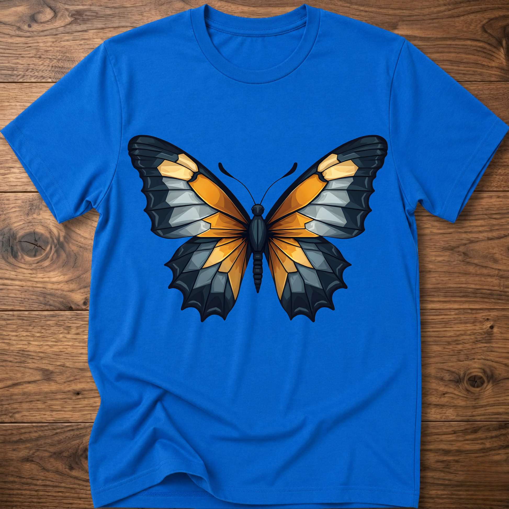Royal blue abstract butterfly T-shirt with colorful wings graphic on front