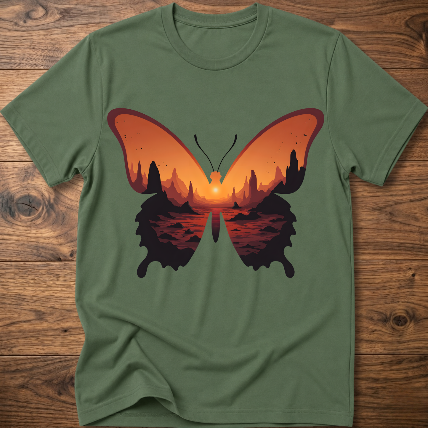 Military green crew-neck T-shirt with colorful butterfly graphic in orange and black
