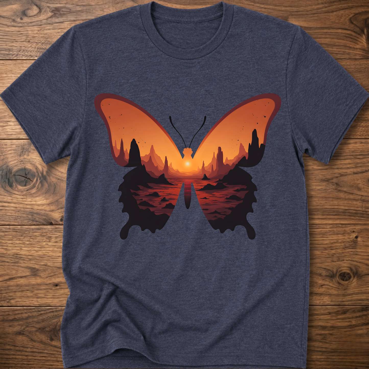 Dark blue crew-neck T-shirt with colorful butterfly graphic in orange and black