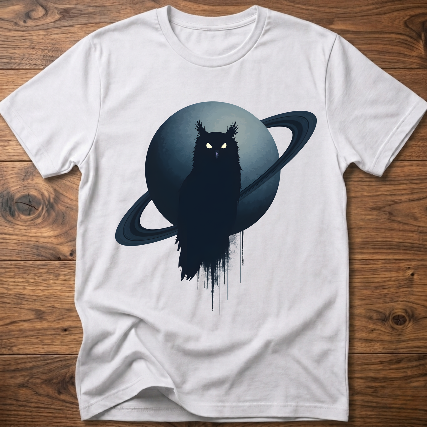 White t-shirt with black owl and Saturn graphic print on the front